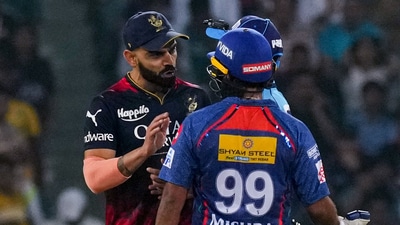 Lucknow Super Giants batter Amit Mishra and Royal Challengers Bangalore player Virat Kohli during the IPL 2023 match (PTI) Lucknow Super Giants batter Amit Mishra and Royal Challengers Bangalore player Virat Kohli during the IPL 2023 match (PTI)