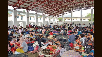 People evacuated from violence-affected areas take rest at a shelter arranged by Indian Army, on Thursday. (ANI) People evacuated from violence-affected areas take rest at a shelter arranged by Indian Army, on Thursday. (ANI)