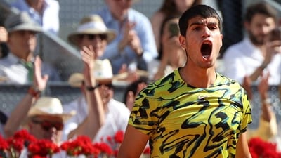 Spain's Carlos Alcaraz celebrates beating Croatia's Borna Coric after their 2023 ATP Tour Madrid Open tennis tournament singles semi-final match at Caja Magica in Madrid (AFP) Spain's Carlos Alcaraz celebrates beating Croatia's Borna Coric after their 2023 ATP Tour Madrid Open tennis tournament singles semi-final match at Caja Magica in Madrid (AFP)