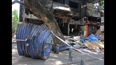Two persons, including shop owner Sudhir Kolte and a motorcyclist Sagar Sanas, sustained injuries in the incident. (HT PHOTO)
