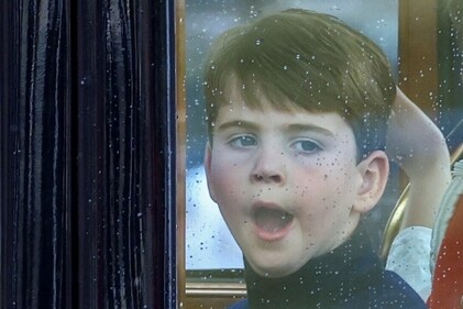 Prince Louis yawning during his coach travel. (REUTERS)