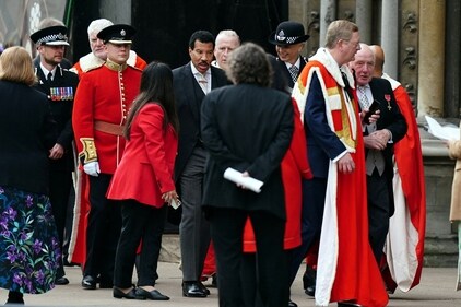 Lionel Richie (centre) arriving ahead of the coronation ceremony of King Charles III and Queen Camilla at Westminster Abbey, London. ( REUTERS)