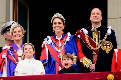 Prince Louis standing on the balcony of Buckingham Palace along with other members of the royal family. (via REUTERS)