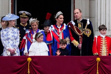 Prince Louis waves, standing next to his parents Prince William and Kate, Princess of Wales. (AP) Prince Louis waves, standing next to his parents Prince William and Kate, Princess of Wales. (AP)