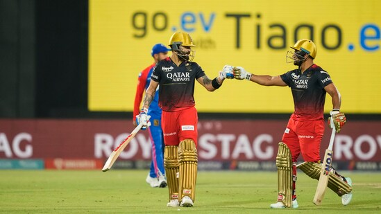 Royal Challengers Bangalore batter Virat Kohli celebrates his fifty with Mahipal Lomror during IPL 2023 match against Delhi Capitals(PTI)