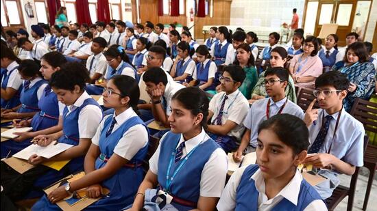 Students attending a conference on democracy at St Kabir Public School, Sector 26, Chandigarh. (Keshav Singh/HT)
