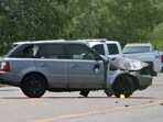 Law enforcement officers investigate the scene after a deadly incident where a car ran into pedestrians near Ozanam Center, a shelter for migrants and homeless, in Brownsville, Texas, U.S.