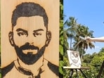 Vignesh drawing a portrait of Virat Kohli, former India skipper, on wood using a magnifying glass. Vignesh drawing a portrait of Virat Kohli, former India skipper, on wood using a magnifying glass.