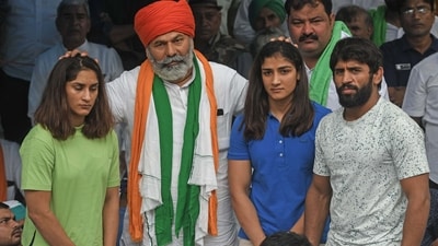 BKU spokesperson Rakesh Tikait expresses solidarity with wrestlers, including Vinesh Phogat and Bajrang Punia, during their ongoing protest against WFI chief Brij Bhushan Singh at Jantar Mantar in New Delhi. (ANI file) BKU spokesperson Rakesh Tikait expresses solidarity with wrestlers, including Vinesh Phogat and Bajrang Punia, during their ongoing protest against WFI chief Brij Bhushan Singh at Jantar Mantar in New Delhi. (ANI file)