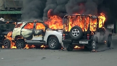 Vehicles set ablaze after a clash broke out during the 'Tribal Solidarity March called by the All Tribal Student Union Manipur (ATSUM) in the Torbung area of Churachandpur to protest the demand of Meiteis, who dominate the Imphal Valley, in Manipur on Thursday. (ANI) Vehicles set ablaze after a clash broke out during the 'Tribal Solidarity March called by the All Tribal Student Union Manipur (ATSUM) in the Torbung area of Churachandpur to protest the demand of Meiteis, who dominate the Imphal Valley, in Manipur on Thursday. (ANI)