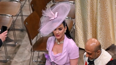 Katy Perry (L) departs the Coronation of King Charles III and Queen Camilla on May 06, 2023 in London. (via REUTERS)
