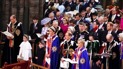 Britain's Prince Harry, right center row, looks on as front row from left, Prince William, Princess Charlotte, Prince Louis, Kate, Princess of Wales and Edward the Duke of Edinburgh attend the coronation ceremony of King Charles III and Queen Camilla in Westminster Abbey, London, Saturday May 6, 2023. (Yui Mok, Pool via AP) (AP) Britain's Prince Harry, right center row, looks on as front row from left, Prince William, Princess Charlotte, Prince Louis, Kate, Princess of Wales and Edward the Duke of Edinburgh attend the coronation ceremony of King Charles III and Queen Camilla in Westminster Abbey, London, Saturday May 6, 2023. (Yui Mok, Pool via AP) (AP)