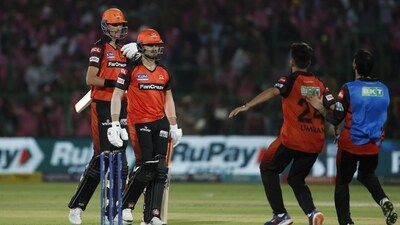 Sunrisers Hyderabad's Marco Jansen, left, walks with teammate Abdul Samad after his team's win over Rajasthan Royals (AP) Sunrisers Hyderabad's Marco Jansen, left, walks with teammate Abdul Samad after his team's win over Rajasthan Royals (AP)