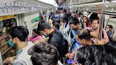 Officials said that police will also soon be deployed in Metro coaches – both in uniforms and civil clothes. DMRC said it also plans to utilise the CCTV cameras installed inside the Metro coaches more frequently to identify objectionable behaviour or to identify people making videos, which may inconvenience other passengers. (Sanchit Khanna/HT Photo) Officials said that police will also soon be deployed in Metro coaches – both in uniforms and civil clothes. DMRC said it also plans to utilise the CCTV cameras installed inside the Metro coaches more frequently to identify objectionable behaviour or to identify people making videos, which may inconvenience other passengers. (Sanchit Khanna/HT Photo)