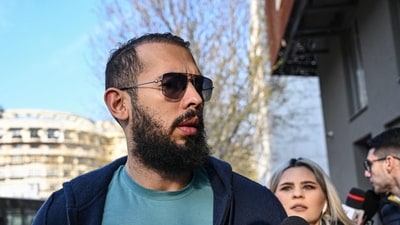 Controversial influencer Andrew Tate arrives at the Directorate for the Investigation of Organized Crime and Terrorism (DIICOT) to attend a hearing. (AFP) Controversial influencer Andrew Tate arrives at the Directorate for the Investigation of Organized Crime and Terrorism (DIICOT) to attend a hearing. (AFP)