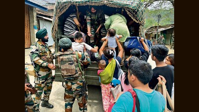 Security personnel during a rescue operation in Manipur on Sunday. (ANI)