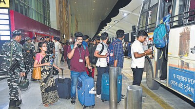 Students from Tripura, studying in Manipur, arrive in Agartala by a special flight arranged by the government. (ANI)