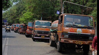 To keep up with the ever-growing water requirement, many of the 23 merged villages have seen a sharp rise in the number of tanker trips during the summer season. (RAVINDRA JOSHI/ HT PHOTO)