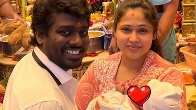 Atlee and Priya with their son. Atlee and Priya with their son.
