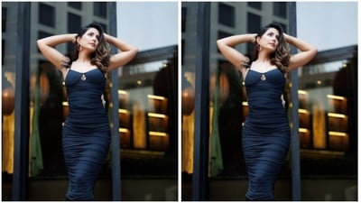 Hina wore her tresses open in wavy curls with a side part as she posed for the pictures and looked like a diva.&nbsp; (Instagram/@realhinakhan)