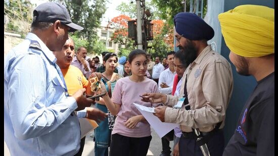 A student during security check outside a NEET-UG exam centre. (Manish/Ht)