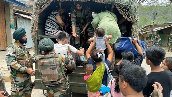Indian Army with Assam Rifles personnel conduct rescue operation in the violence-affected Manipur, on Sunday.&nbsp;(ANI)