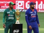File photo of Rohit Sharma and Babar Azam posing with the Asia Cup Trophy
