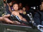People are evacuated by the Indian Army to a temporary shelter as they flee ethnic violence that has hit Manipur, near Imphal, People are evacuated by the Indian Army to a temporary shelter as they flee ethnic violence that has hit Manipur, near Imphal,