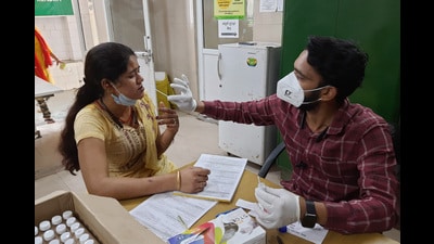A health worker collects a swab sample for Covid-19 test, Ghaziabad, April 19. 2023 (SAKIB ALI/HT) A health worker collects a swab sample for Covid-19 test, Ghaziabad, April 19. 2023 (SAKIB ALI/HT)