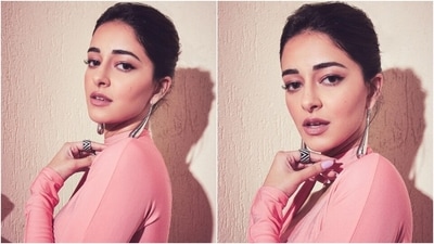 Ananya styled the ensemble with minimal accessories, including high heels, dangling metallic earrings, and statement monochrome embellished rings. She chose a messy low bun, darkened brows, winged eyeliner, mascara on the lashes, subtle pink eye shadow, glossy pink lip shade, rouged cheekbones, and a dewy base for the glam. (Instagram) Ananya styled the ensemble with minimal accessories, including high heels, dangling metallic earrings, and statement monochrome embellished rings. She chose a messy low bun, darkened brows, winged eyeliner, mascara on the lashes, subtle pink eye shadow, glossy pink lip shade, rouged cheekbones, and a dewy base for the glam. (Instagram)