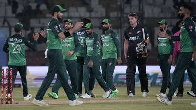 Pakistan's Babar Azam, center, and teammates congratulate each others (AP) Pakistan's Babar Azam, center, and teammates congratulate each others (AP)
