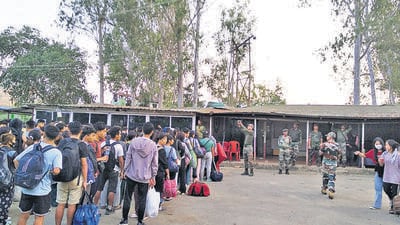 Several Kukis arrive at the Assam Rifles headquarters at Pallel, in Kakching town of Manipur, on Monday. Several Kukis arrive at the Assam Rifles headquarters at Pallel, in Kakching town of Manipur, on Monday.