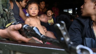 People are evacuated by the Indian Army to a temporary shelter as they flee ethnic violence that has hit Manipur, near Imphal, (AFP) People are evacuated by the Indian Army to a temporary shelter as they flee ethnic violence that has hit Manipur, near Imphal, (AFP)