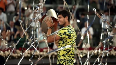 Spain's Carlos Alcaraz celebrates with the trophy after winning the 2023 ATP Tour Madrid Open tennis tournament (AFP) Spain's Carlos Alcaraz celebrates with the trophy after winning the 2023 ATP Tour Madrid Open tennis tournament (AFP)