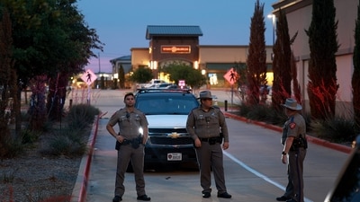 Officials continue to investigate the May 6 mass shooting at the Allen Premium Outlets mall. (Getty Images via AFP) Officials continue to investigate the May 6 mass shooting at the Allen Premium Outlets mall. (Getty Images via AFP)