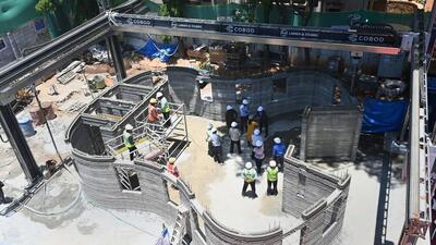 Workers indulge in their work at the construction site of first-of-its-kind 3D printed post office building, in Bengaluru on April 11 (PTI) Workers indulge in their work at the construction site of first-of-its-kind 3D printed post office building, in Bengaluru on April 11 (PTI)