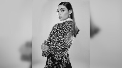 Athiya Shetty's outfit features an embellished top, wide-leg trousers and a statement waist accessory.&nbsp; (Instagram/@athiyashetty)