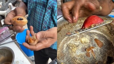 Street vendor adding sapodilla and apple to tea. (Instagram/@delhifoodcrush) Street vendor adding sapodilla and apple to tea. (Instagram/@delhifoodcrush)