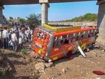 Khargone: Locals gather at the site after a bus fell from a bridge in Madhya Pradesh's Khargone district, Tuesday, May 9, 2023. At least 15 people were killed and 25 others injured in the accident, according to officials.