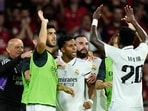 Real Madrid's Rodrygo, centre, is congratulated by team mates after scoring his side's second goal Real Madrid's Rodrygo, centre, is congratulated by team mates after scoring his side's second goal