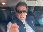 Former Pakistan Prime Minister Imran Khan gestures in a video statement, at an unknown location in Pakistan, in this screen grab obtained from a social media video.