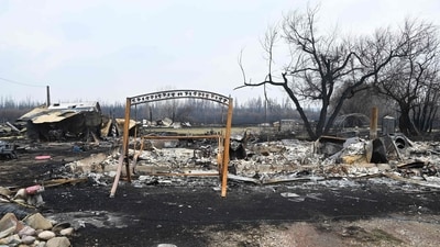 Canada struggled on Monday to control wildfires that have forced thousands to flee, halted oil production and threaten to raze towns. (AFP) Canada struggled on Monday to control wildfires that have forced thousands to flee, halted oil production and threaten to raze towns. (AFP)