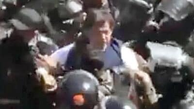 Former Pakistan PM and Pakistan Tehreek-e-Insaf (PTI) chief Imran Khan being arrested by Pakistan Rangers from the Islamabad High Court complex in Pakistan on Tuesday (Pakistan Tehreek-e-Insaf (PTI) t) Former Pakistan PM and Pakistan Tehreek-e-Insaf (PTI) chief Imran Khan being arrested by Pakistan Rangers from the Islamabad High Court complex in Pakistan on Tuesday (Pakistan Tehreek-e-Insaf (PTI) t)