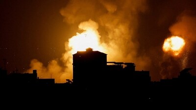 Smoke and flames rise into the sky after the Israeli military said in a statement that it struck Islamic Jihad targets. (REUTERS)