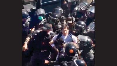 Imran Khan was surrounded by security personnel and dragged out of the court. (HT Photo) Imran Khan was surrounded by security personnel and dragged out of the court. (HT Photo)