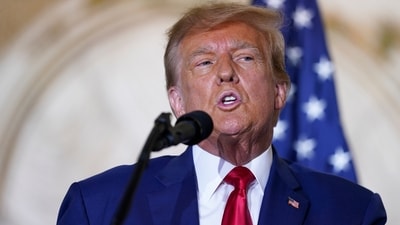 FILE - Former President Donald Trump speaks at his Mar-a-Lago estate Tuesday, April 4, 2023, in Palm Beach, Fla., after being arraigned earlier in the day in New York City. Donald Trump's town hall forum on CNN on Wednesday, May 10, 2023, is the first major TV event of the 2024 presidential campaign, and a big test for the chosen moderator, Kaitlan Collins. The former White House correspondent and now-morning show host must juggle questions from an audience of Republican primary voters, her own follow-ups and the need to fact-check false statements. (AP Photo/Evan Vucci, File) (AP) FILE - Former President Donald Trump speaks at his Mar-a-Lago estate Tuesday, April 4, 2023, in Palm Beach, Fla., after being arraigned earlier in the day in New York City. Donald Trump's town hall forum on CNN on Wednesday, May 10, 2023, is the first major TV event of the 2024 presidential campaign, and a big test for the chosen moderator, Kaitlan Collins. The former White House correspondent and now-morning show host must juggle questions from an audience of Republican primary voters, her own follow-ups and the need to fact-check false statements. (AP Photo/Evan Vucci, File) (AP)