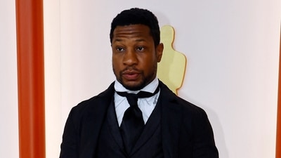 Jonathan Majors attends the champagne-colored red carpet during the Oscars arrivals at the 95th Academy Awards in Hollywood, Los Angeles, California, U.S., (REUTERS)