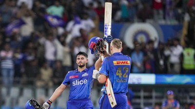 Nehal Wadhera and Cameron Green celebrate their win against Royal Challengers Bangalore (PTI)