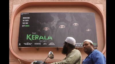 People ride past a poster of a Hindi movie titled "The Kerala Story", outside a cinema in Mumbai, India May 9, 2023. REUTERS/Francis Mascarenhas (REUTERS) People ride past a poster of a Hindi movie titled "The Kerala Story", outside a cinema in Mumbai, India May 9, 2023. REUTERS/Francis Mascarenhas (REUTERS)