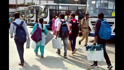 Polling officials with EVMs and other materials leave for their respective polling booths on the eve of Karnataka assembly elections, in Bengaluru on Tuesday. (ANI) Polling officials with EVMs and other materials leave for their respective polling booths on the eve of Karnataka assembly elections, in Bengaluru on Tuesday. (ANI)